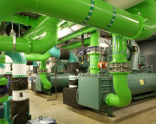 Mechanical room with lime green pipes